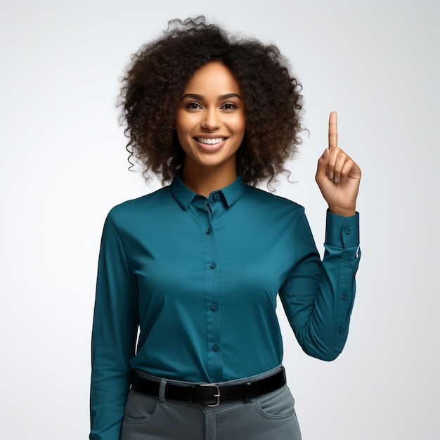 Stock photo of an afroamerican business woman pointing with finger gesture