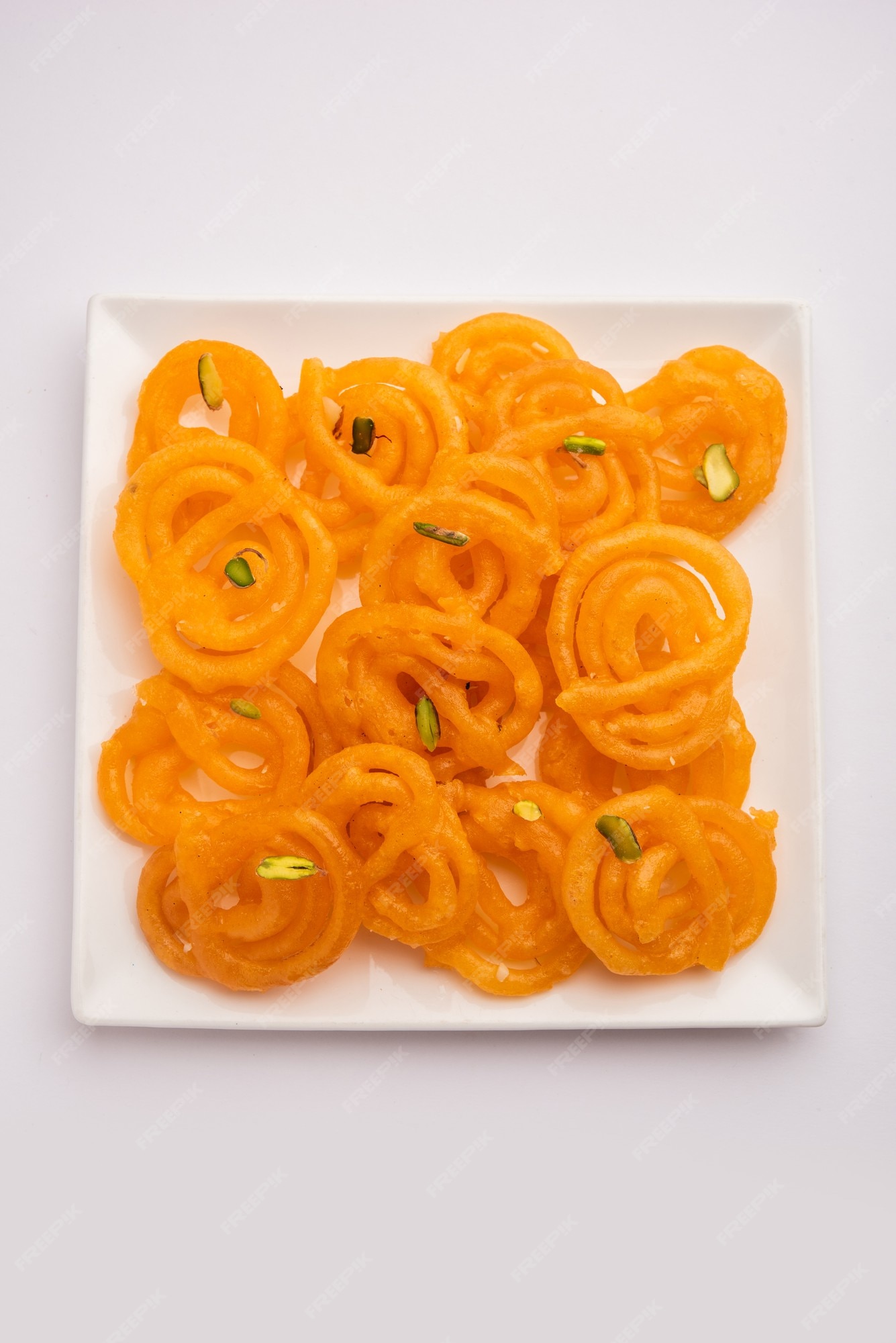 Premium Photo | Stock photo of jalebi or jilbi or imarati, indian sweet ...