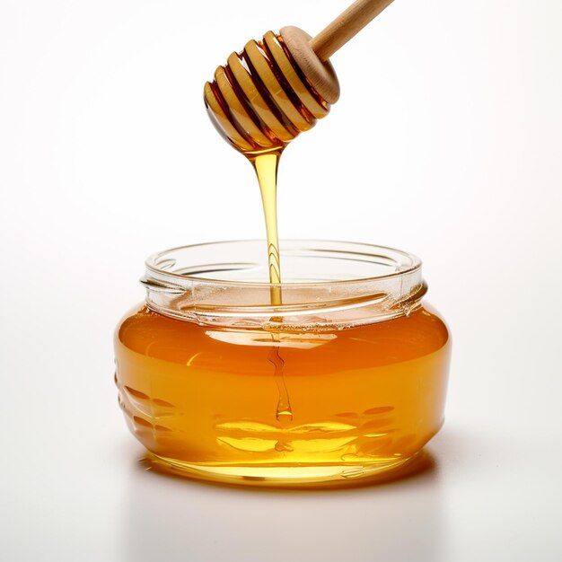 A stock photo jar of honey white background