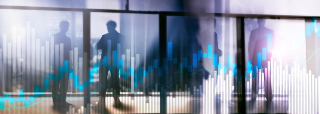 stock trading candlestick chart and diagrams on blurred office center background
