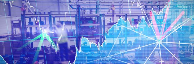 Stocks and shares against male factory worker in a factory
warehouse