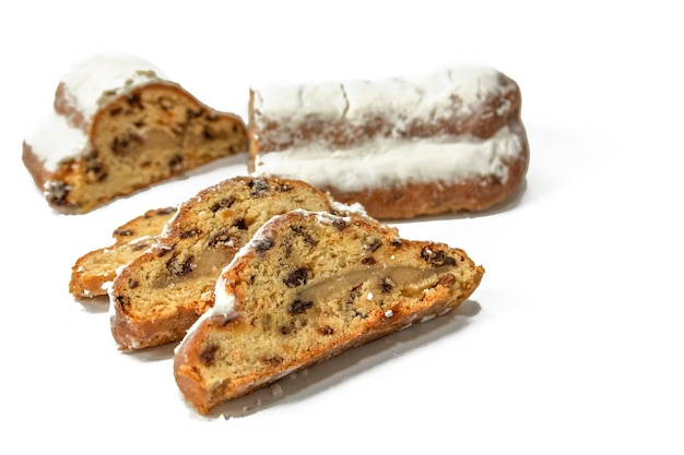 Stollen stuffed sweet bread isolated on a white background German food concept