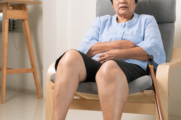 Stomachache of old woman, health problem concept