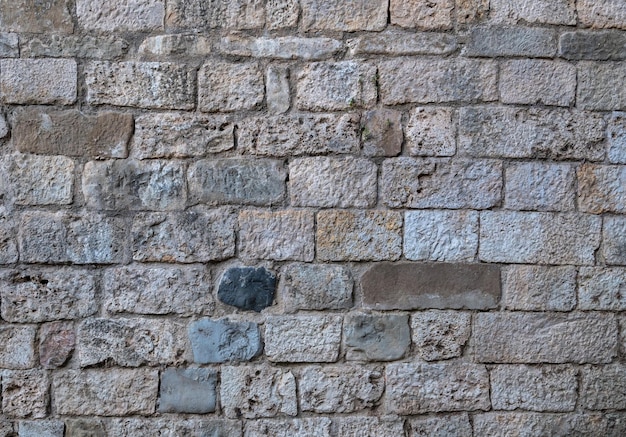 Stone background of a medieval castle wall