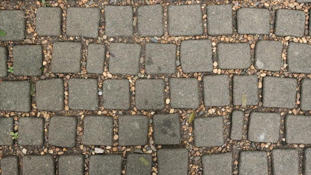 Stone block road. Concrete block floor.