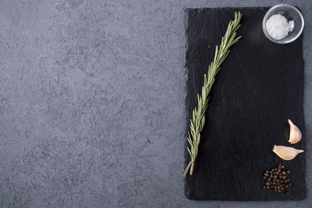 stone  board  herbs and spices. top view