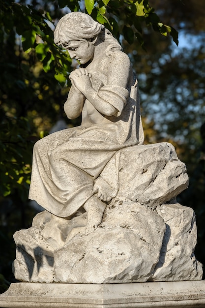 Stone cemetery statue or sculpture