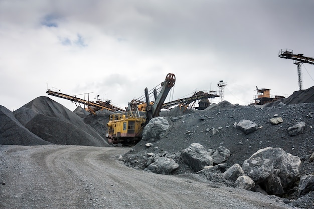 Photo stone crusher in surface mine quarry