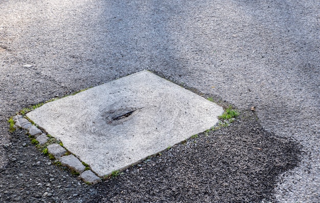 stone culvert in the asphalt