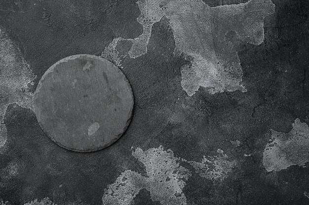 Stone cutting board empty set with copy space for text or food with copy space for text or food, top view flat lay, on black dark stone table background