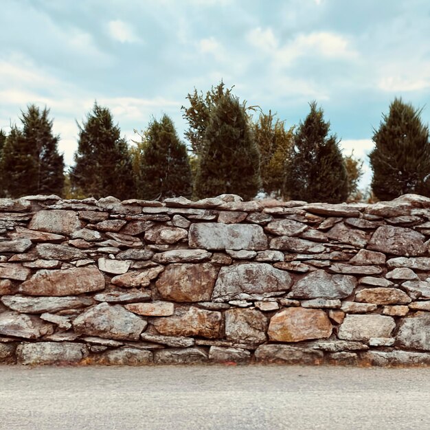 stone fence of solid pieces of stone