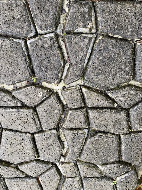 A stone floor with the word " in the middle "