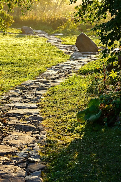 Stone footpath for hiking in the garden