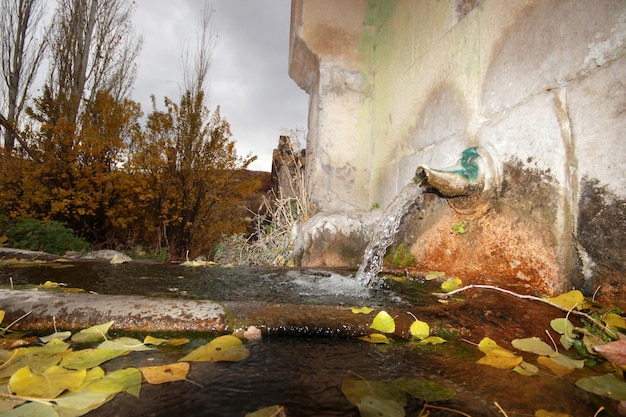 Stone fountain mountain water