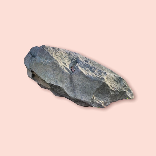 写真 ベージュの背景に分離された石