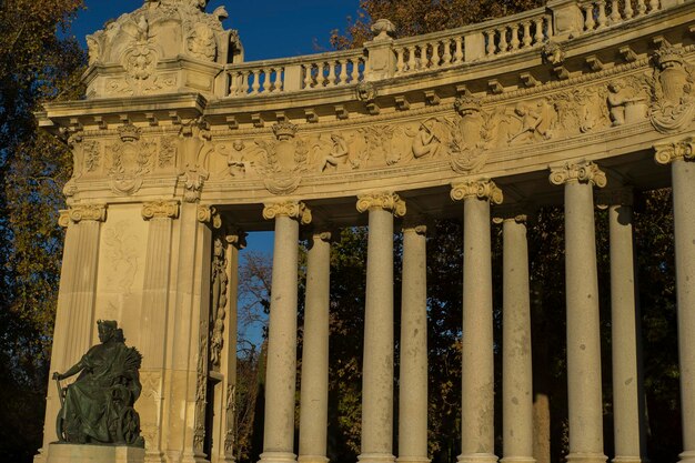 Stone monument with Ionic columns in the Jardin del Retiro in Madrid, Spain