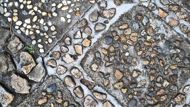 Stone pavement mosaic surface close up