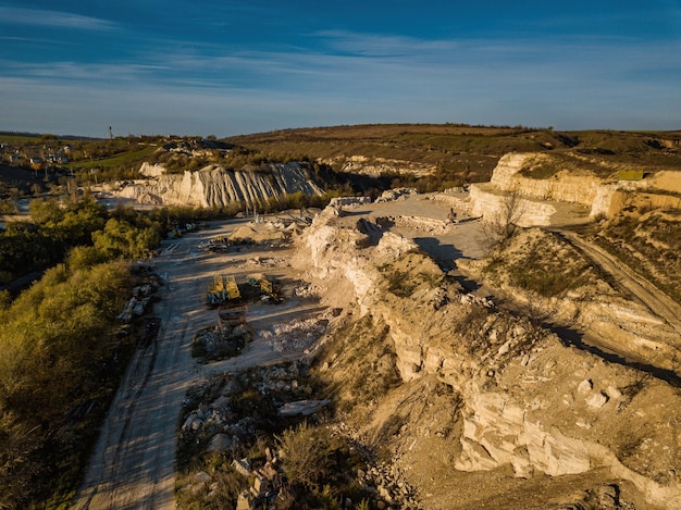 Stone Quarry Aerial. Heavy machinery working at stone qaurry.