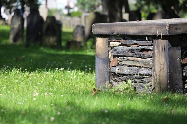 Stone structure on field in cemetery