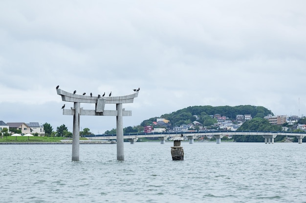 Stone torii with water in Fukuoka city