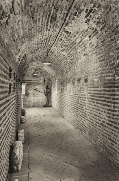 Stone tunnel and knight armor in black and white