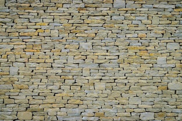 Stone wall background or texture