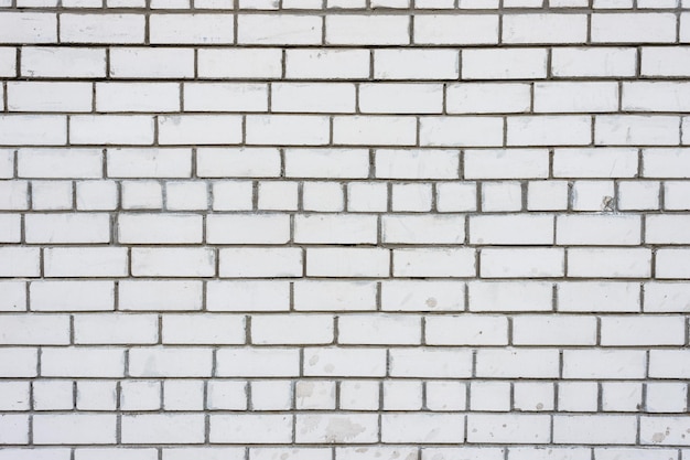 Stone wall carving old white brick pattern background