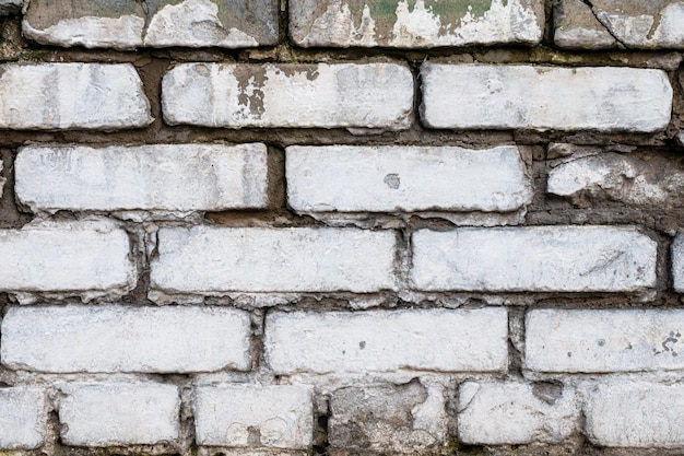 Photo stone wall carving old white brick pattern background