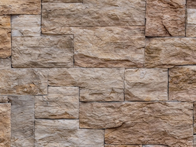 石の壁 淡い茶色の岩の質感 石のグランジの背景 ロッキーな質感の背景