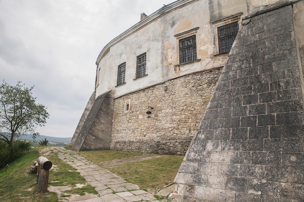 stone wall of a medieval castle on a hill