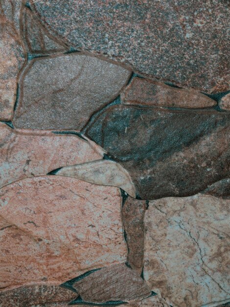 Photo stone wall stone wall as a background or texture