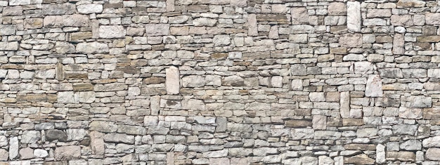 石の壁のテクスチャー ブロックの田舎の石の古い背景のテクスチャ
