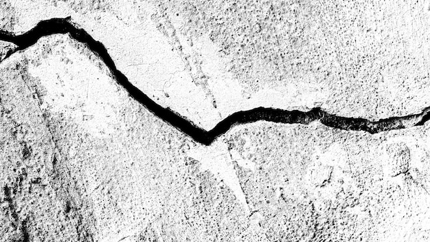 Stone wall with a crack. black and white texture for design