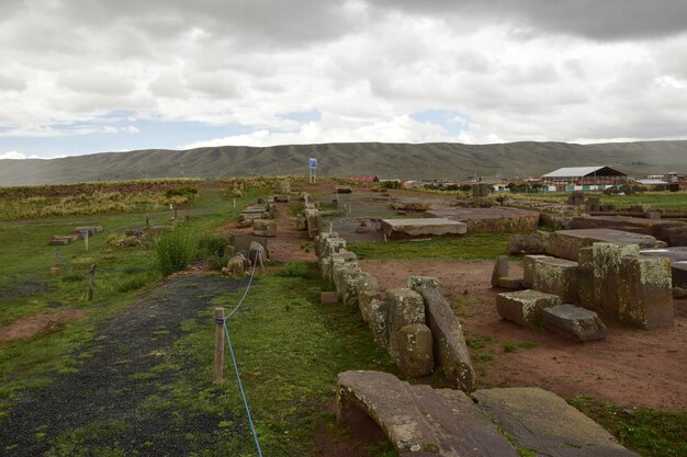 Stone walls uncovered by archaeologists at the Puma Punku a UNESCO world heritage site Tiwanaku Bolivia