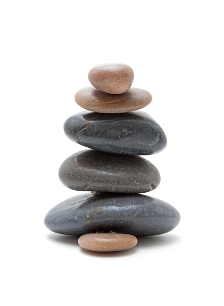 Stones in balanced pile isolated on white background