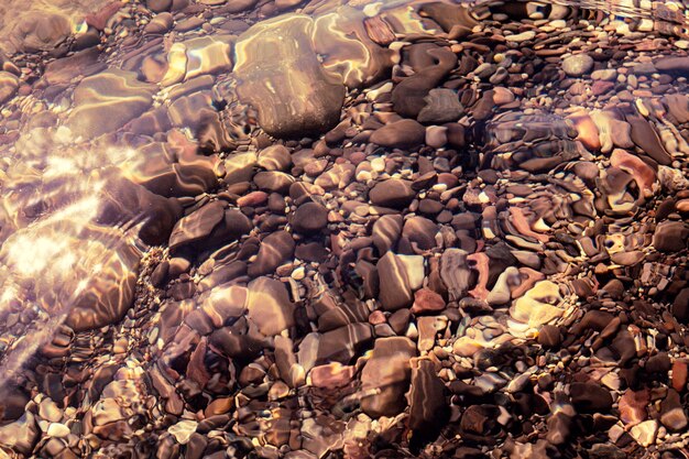 Stones under clear water