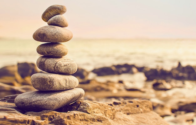 Stones laid out in the form of a pyramid on the seashore