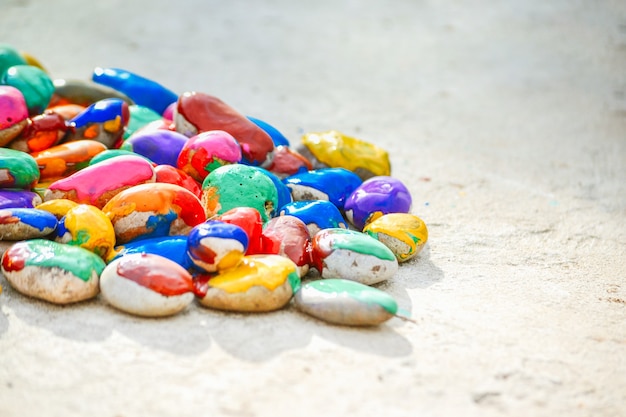 Stones with a smooth surface painted colorful paint