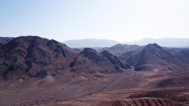 Stony hills of dark color in the steppe