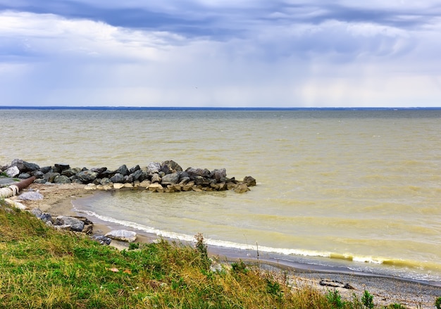 Stony spit on the Ob sea