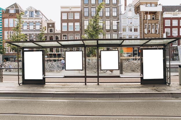 Stop in Amsterdam in Holland with blank advertising banners Mockup concept