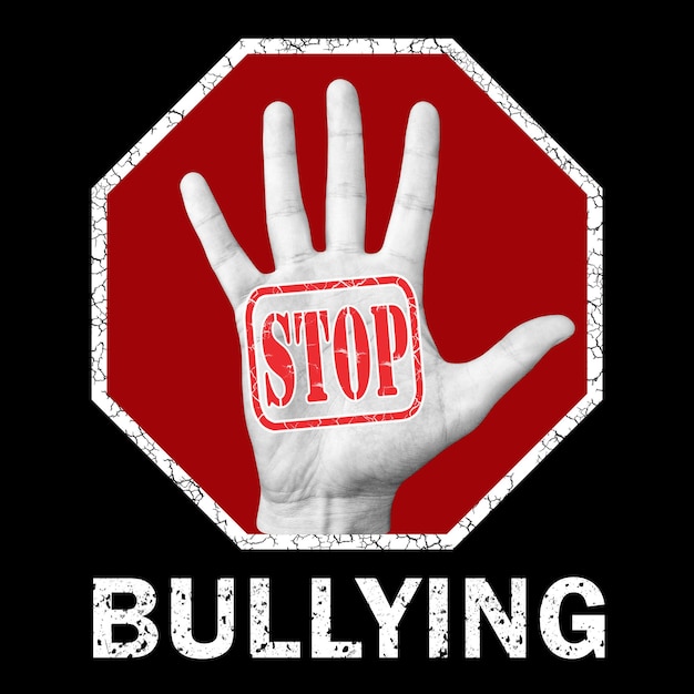 Photo stop bullying conceptual illustration. open hand with the text stop bullying. global social problem