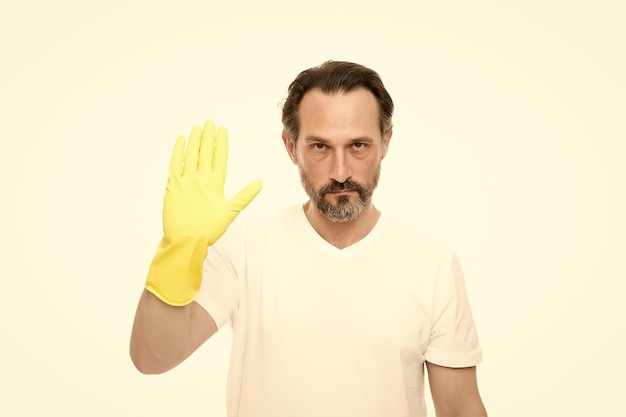 Stop getting dirty mature man wear rubber gloves man cleaning home care your hands while washing dishes hand skin protection everyday routine with domestic duties He will cope with any task