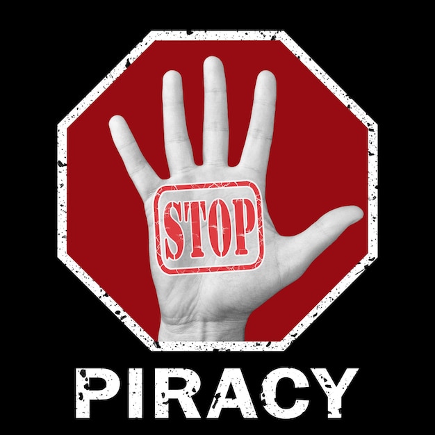 Stop piraterij conceptuele afbeelding. Open hand met de tekst stop piraterij. Wereldwijd sociaal probleem