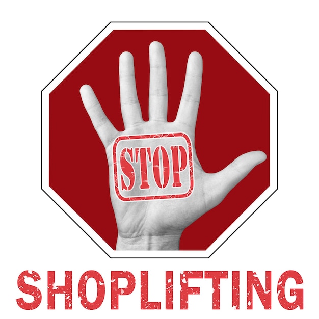 Photo stop shoplifting conceptual illustration. open hand with the text stop shoplifting. global social problem