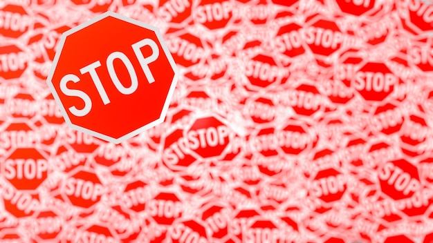 Stop traffic sign symbol on a background of red signs with out-of-focus white letters