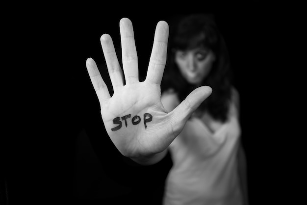 Photo stop violence against women. hand saying stop