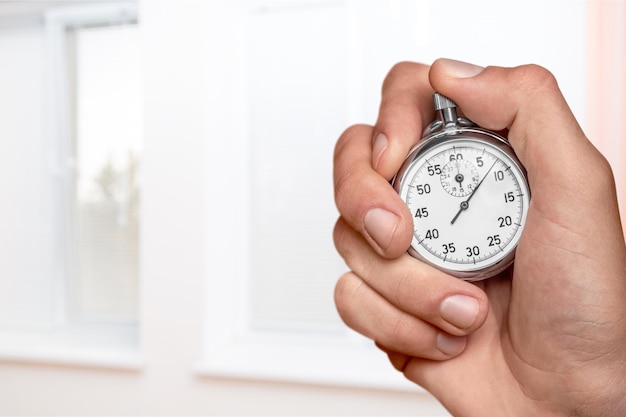 stopwatch in hand