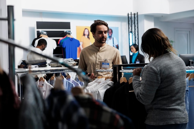 Photo store consultant guiding customer