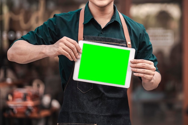 Photo store owner show sign broad and ready to service